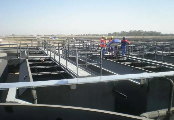Wastewater treatment tanks and walkways